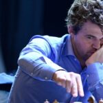 Chess grandmaster returns to play after dispute over jeans resolved – National | Globalnews.ca