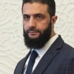 Syrian rebel leader who toppled Assad named interim president – National | Globalnews.ca