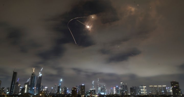 Israel-Iran conflict enters a second week with renewed strikes – National | Globalnews.ca