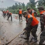 China’s heavy rains prompt flood warnings as landslide kills at least 4 – National | Globalnews.ca