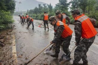 China’s heavy rains prompt flood warnings as landslide kills at least 4 – National | Globalnews.ca