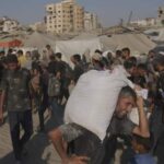 Israeli strikes kill at least 36, a day after aid restrictions in Gaza eased – National | Globalnews.ca
